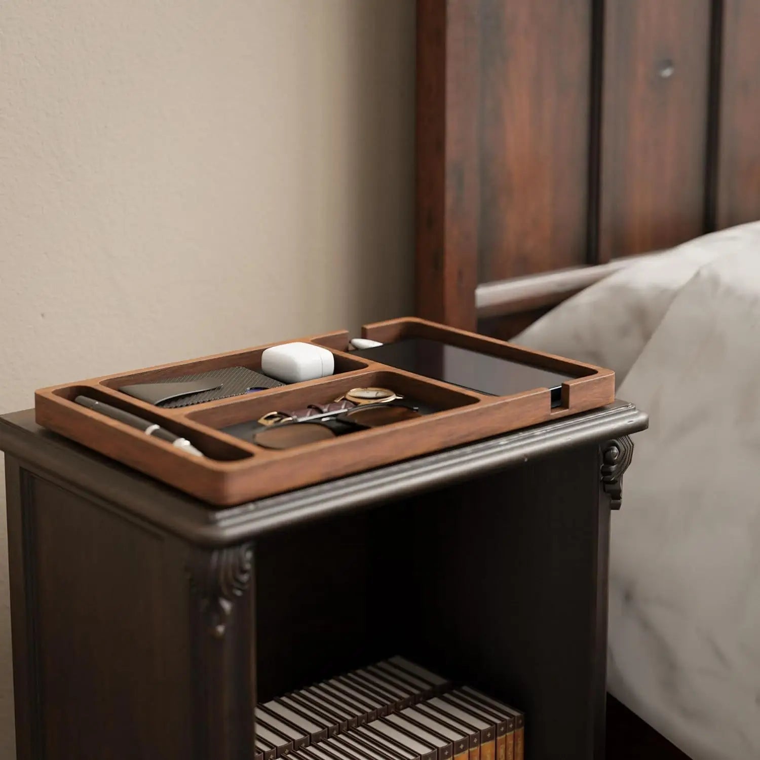 brown wooden desktop charging organizer tray with multiple compartments holding various small items for efficient desk storage and charging management