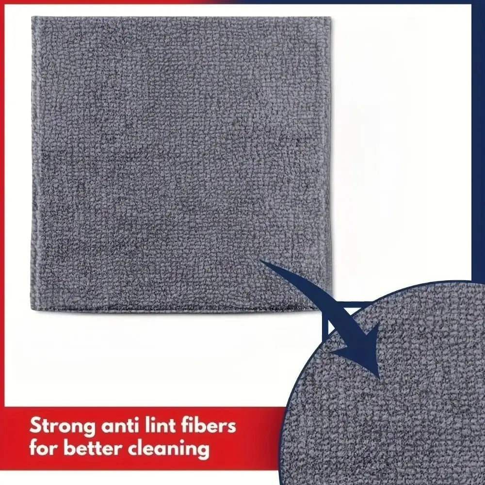 Un paño de limpieza de microfibra gris con un tejido denso y texturizado, diseñado para una limpieza eficaz sin pelusas en un conjunto de paños de limpieza de microfibra gris.