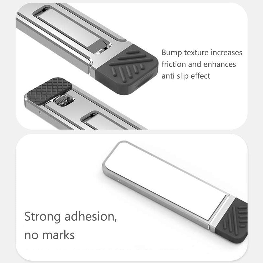 Support de téléphone adhésif argent et noir avec prise texturée, conçu pour un placement sécurisé, illustré depuis le côté arrière, dans le contexte d’un produit de support portable pliant pour ordinateur portable en aluminium.