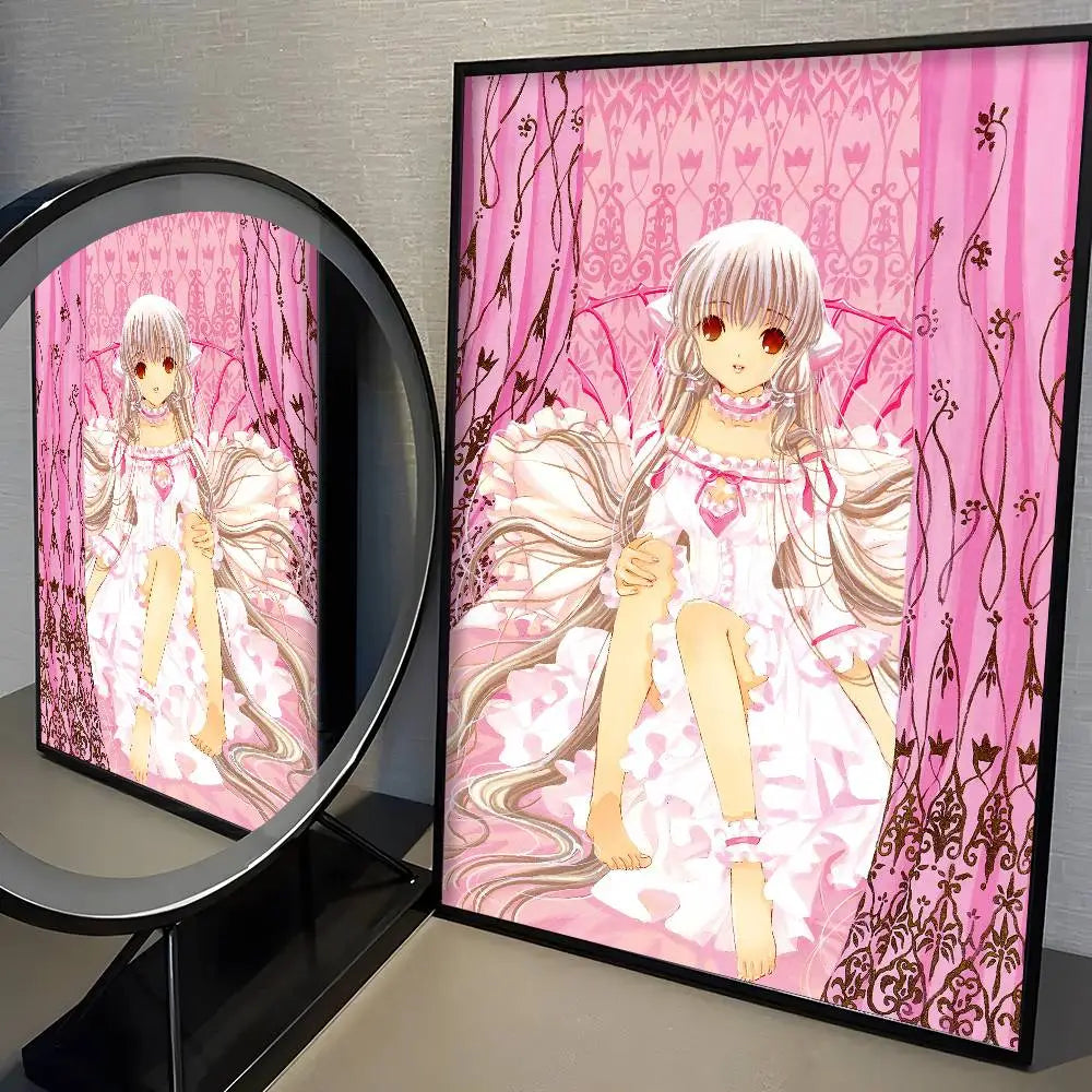 A framed kawaii girl cute anime wall art print poster featuring a silver-haired girl in a white and pink lace dress against a patterned pink background with a modern graphic design.