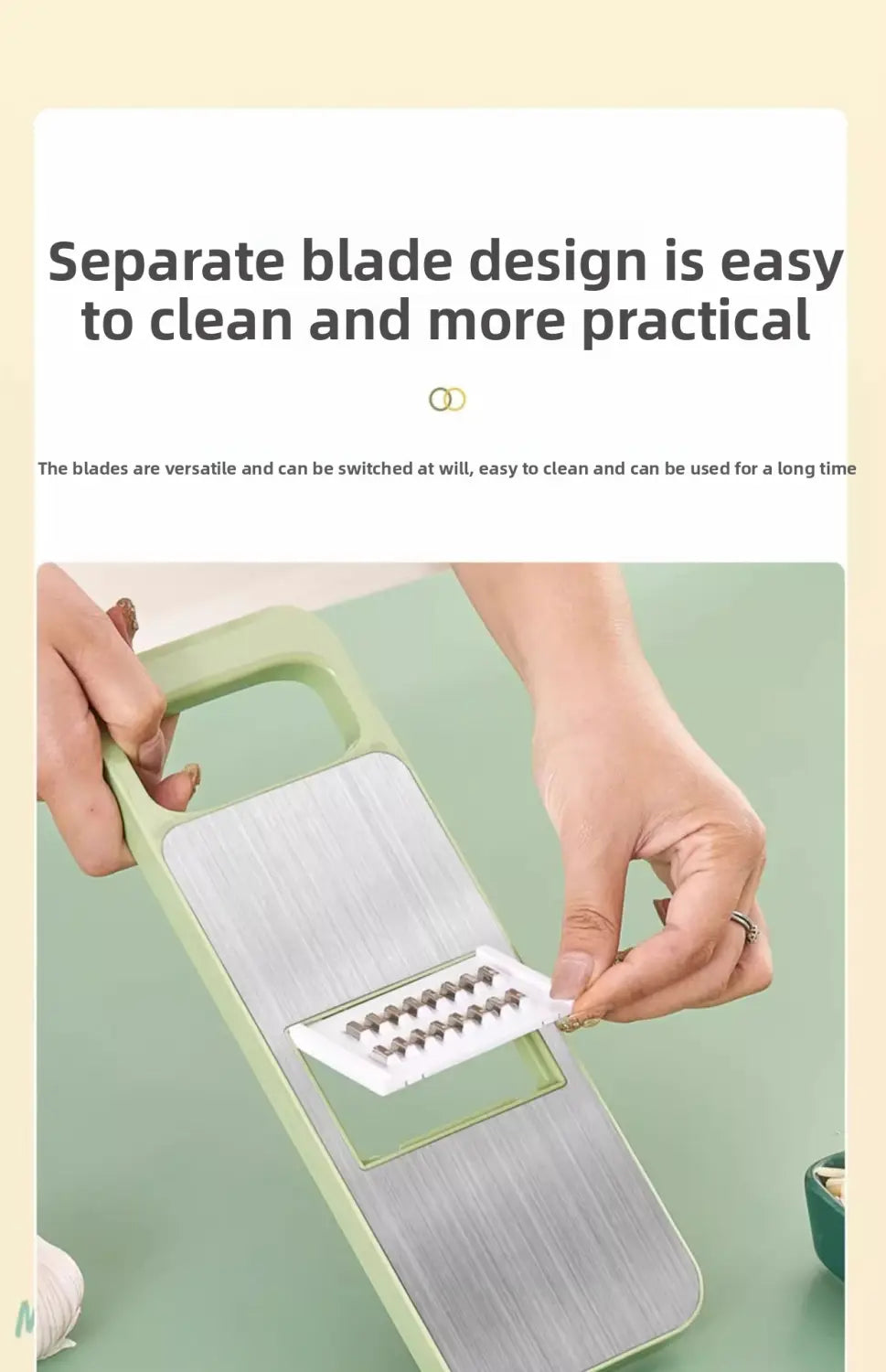 Multi-functional stainless steel vegetable slicer shredder with light green handles and interchangeable blades for different shredding textures.