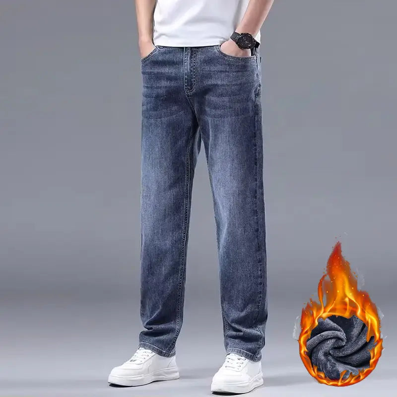 Men fleece lined winter jeans in dark wash denim with a loose straight-leg cut and visible stitching featuring a cozy fleece lining for cold weather.