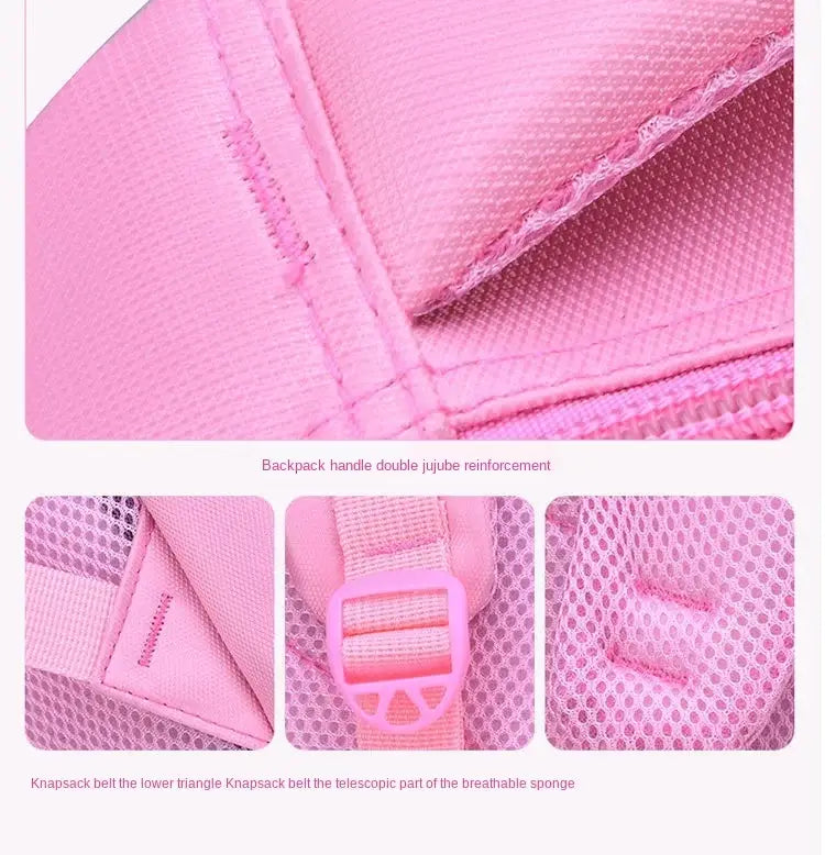 Rosa Katzen-Schulrucksack für Mädchen mit Mesh-Einsätzen und einer Kunststoffschnalle.