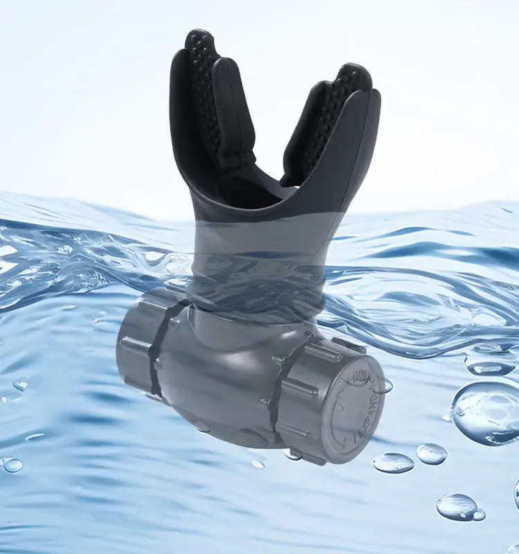 gray plastic respiratory trainer lung fitness device with black rubberized grip and textured surface used for scuba diving regulation