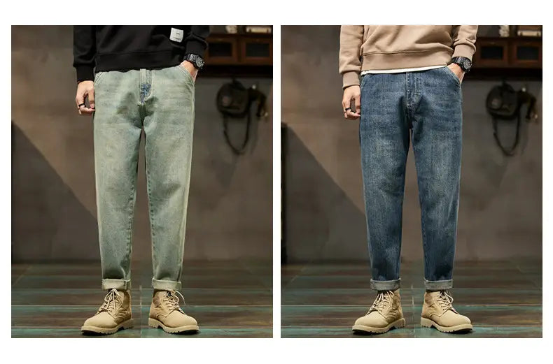 Men loose denim harem jeans in light-wash denim with a relaxed tapered fit and rolled cuffs.