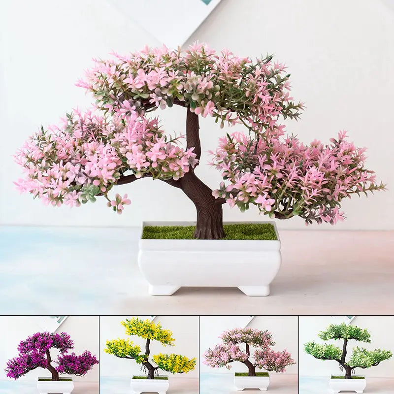 Petite plante artificielle de type bonsaï, petit pot d’arbre, avec des fleurs roses et des feuilles vertes, présentée dans une plante en pot en céramique blanche.