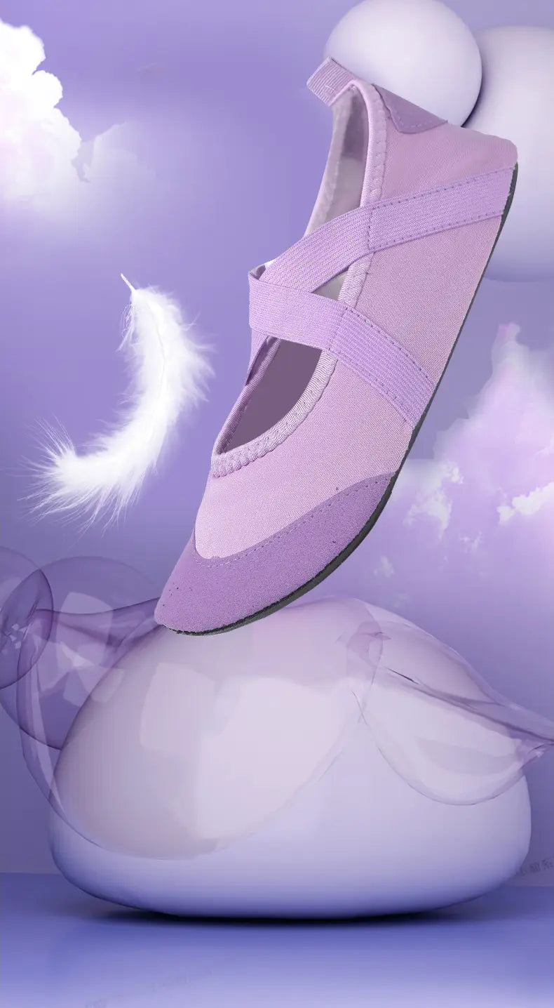 A soft lavender canvas women yoga shoe with elastic straps and a rounded toe designed as anti-slip fitness flats.