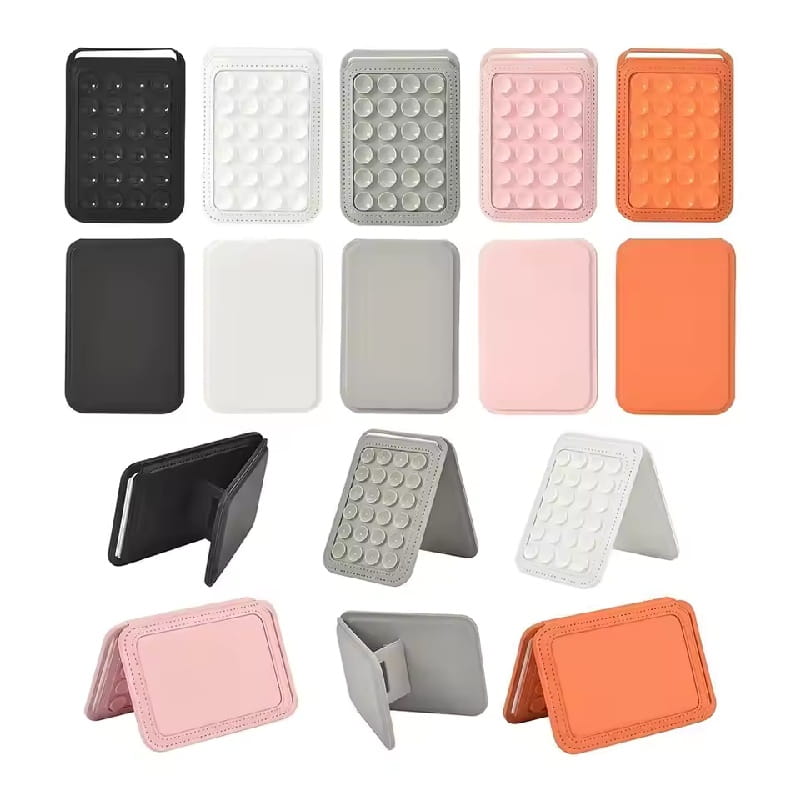 a foldable magnetic card holder phone stand for iphone shown in black white gray pink and orange colors from a front angle