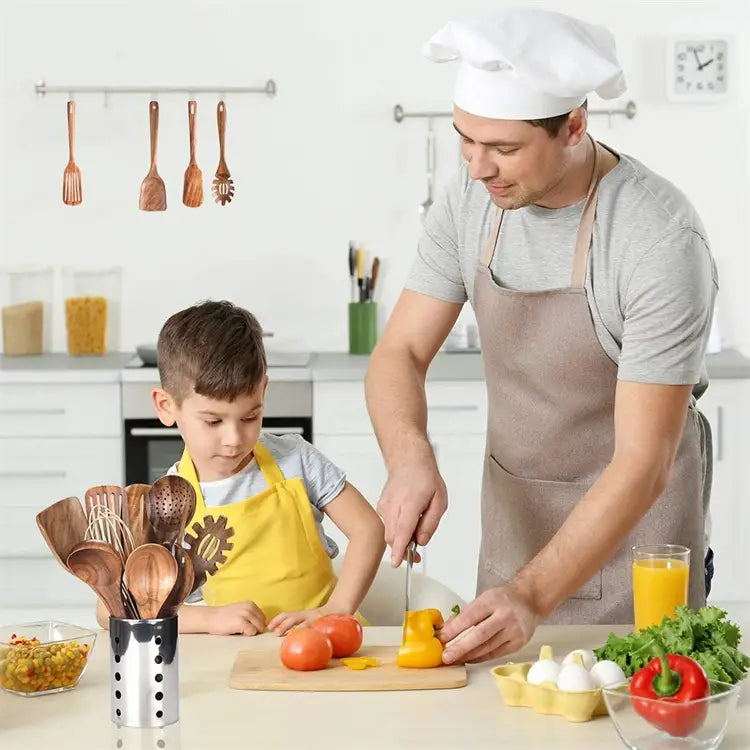 Wooden kitchen utensil holder with natural wood finish and black and silver accents for organizing cooking tools.