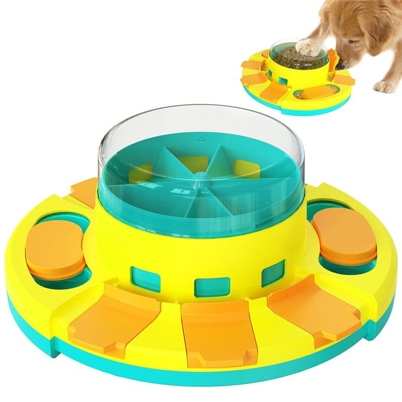 Bright yellow and teal plastic slow feeder dog puzzle and dry food dispenser with a clear dome lid for controlled feeding.