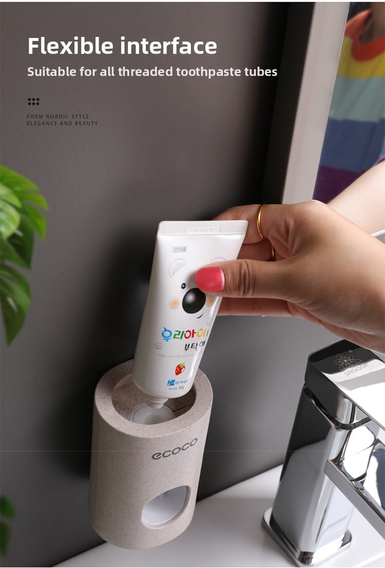 White cylindrical wall mounted toothpaste dispenser and holder set made of matte-finished ceramic material with ecoco branding