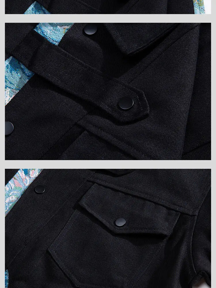 Schwarze Cord-Bomberjacke im Streetwear-Stil mit floraler Stickerei; kontrastierende blau florale Muster-Verzierung entlang des Kragens und der Ärmelbündchen