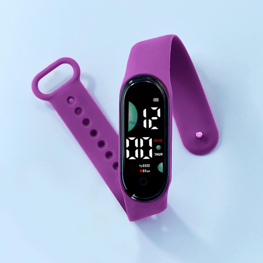 Purple silicone strap electronic watch with a black display screen featuring a large font screen showing time and date for digital sports use.