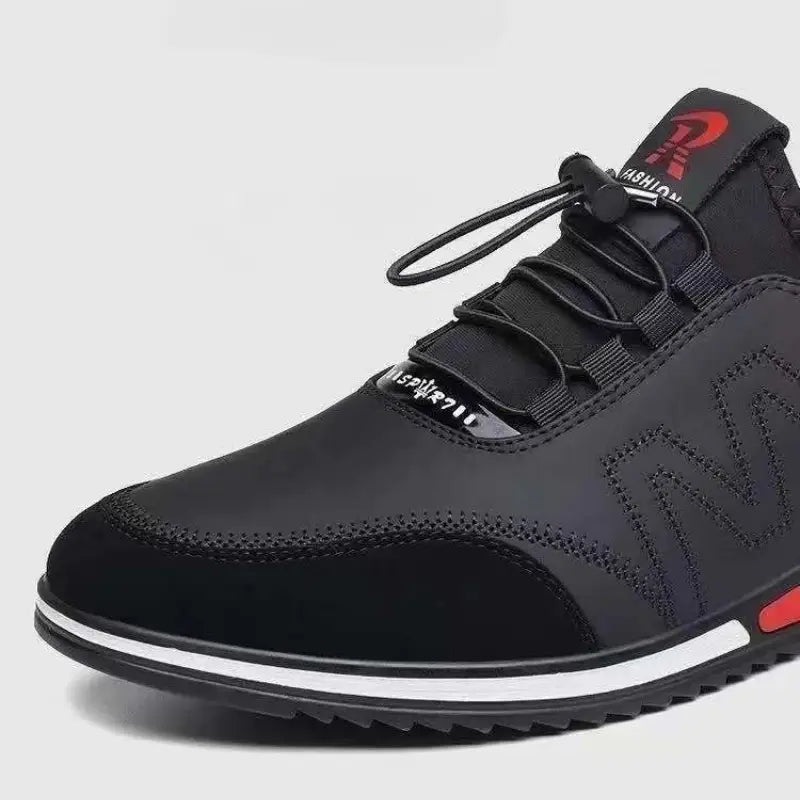 Men casual leather sneakers lightweight non slip shoes in black with red and white accents featuring a textured upper and bold zigzag pattern on the side.