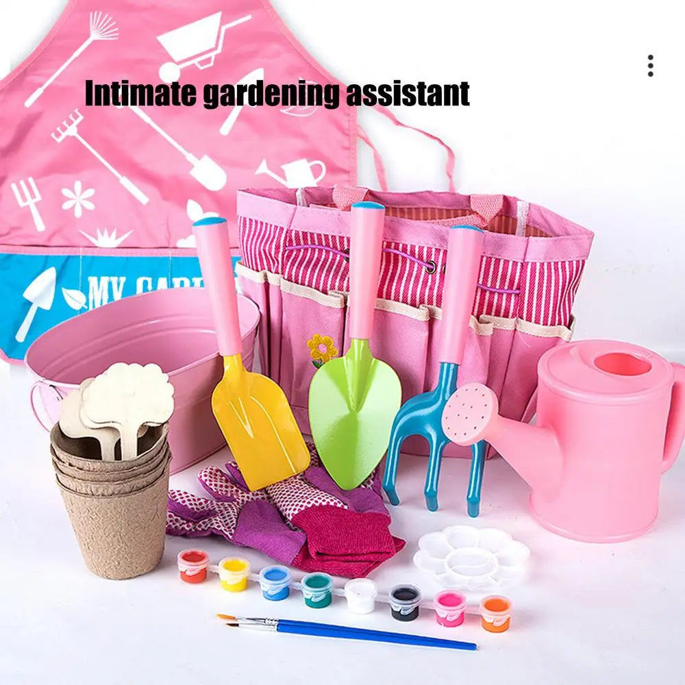 Pink plastic watering can with red spout and handle included in kids gardening set with gardening tools for children.