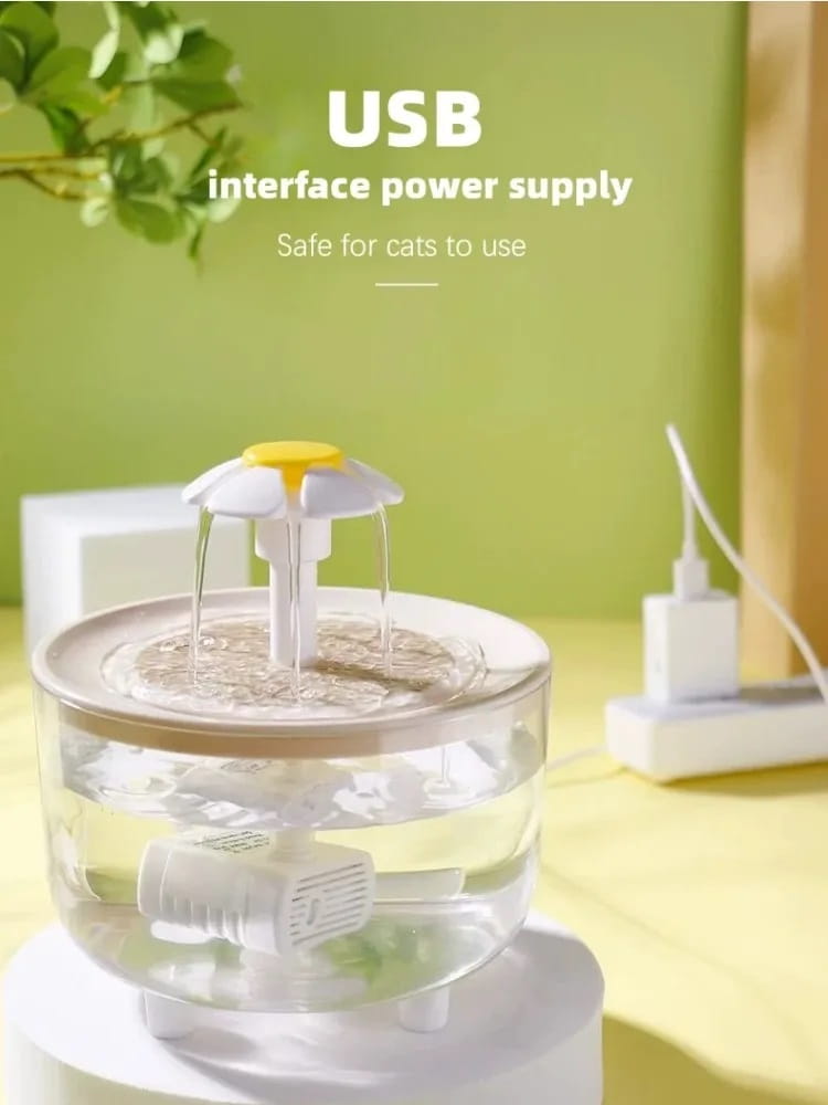 White and yellow cat water fountain with a flower-shaped top and clear plastic water reservoirs, featuring a usb water dispenser design.