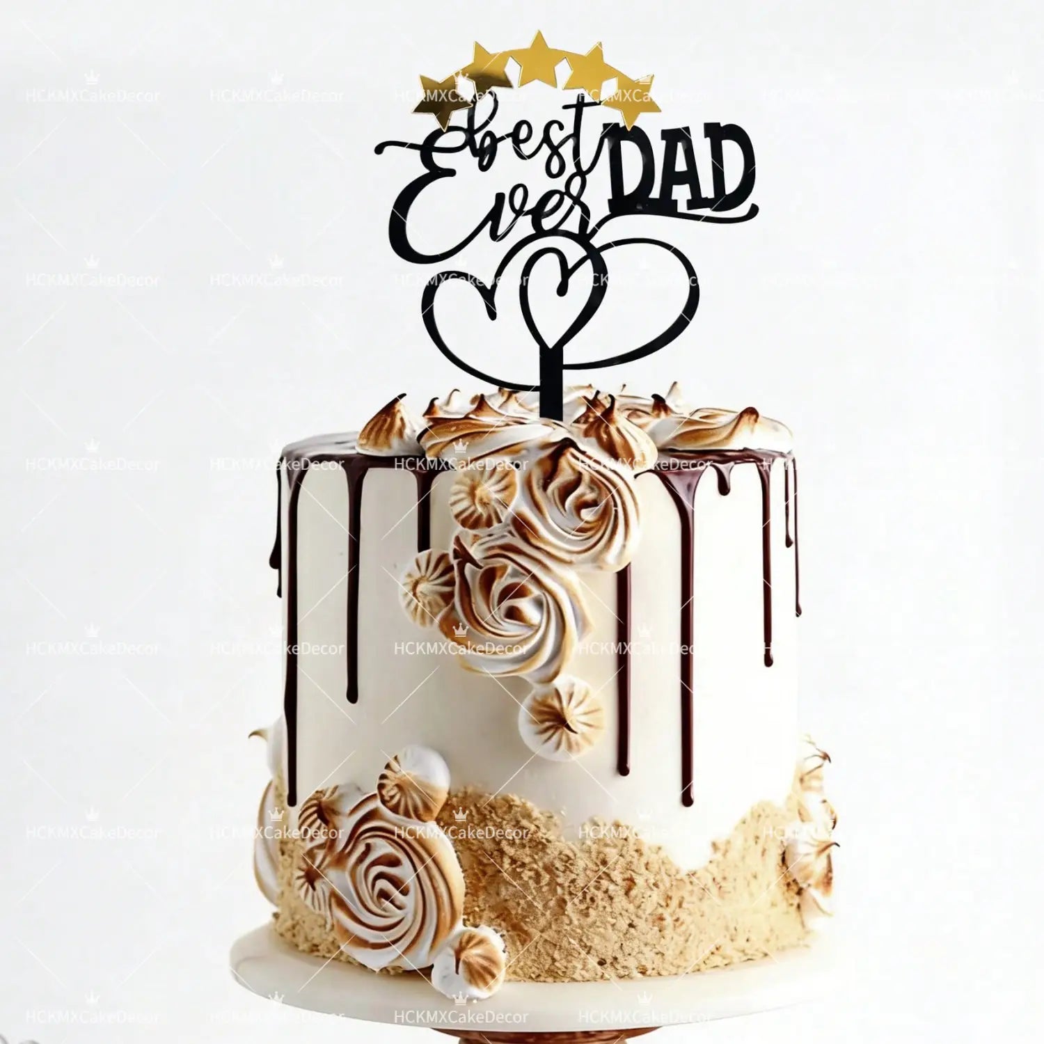 A black and gold acrylic Fathers Day cake topper set featuring a best ever dad design with a heart and five golden stars above the text.