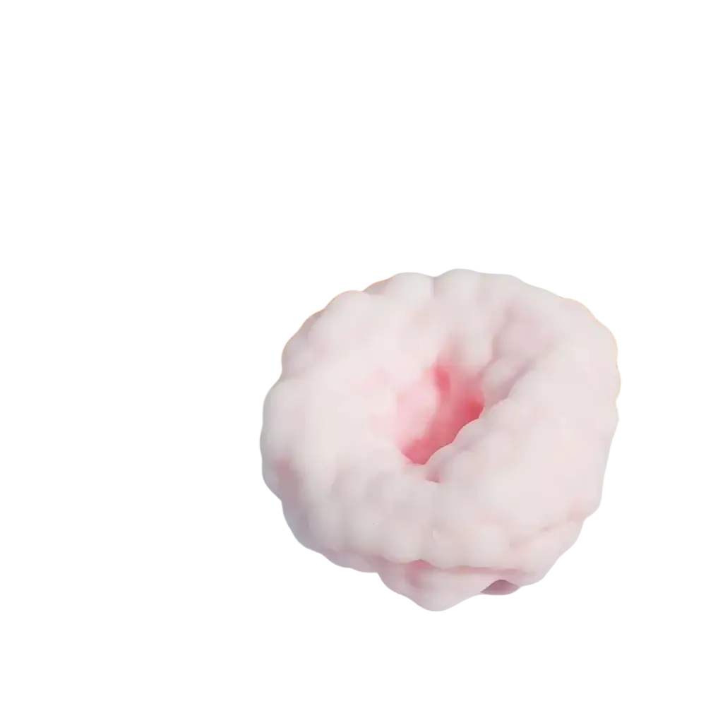 A soft pink donut-shaped squishy toy with a textured surface for stress relief and sensory play