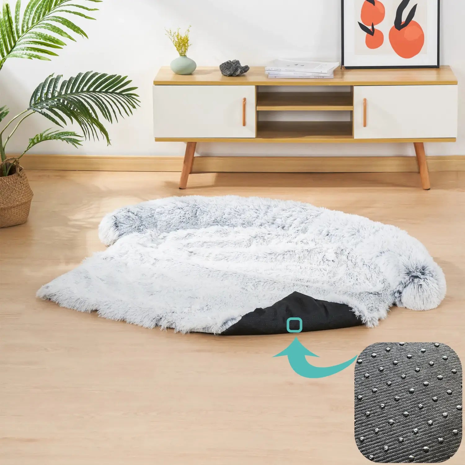 Plush faux fur dog bed sofa in fluffy white with a black non-slip underside designed as a washable warm nest.