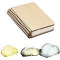 Beige foldable book night light with layered cardboard design and adjustable warm to cool white led lighting options