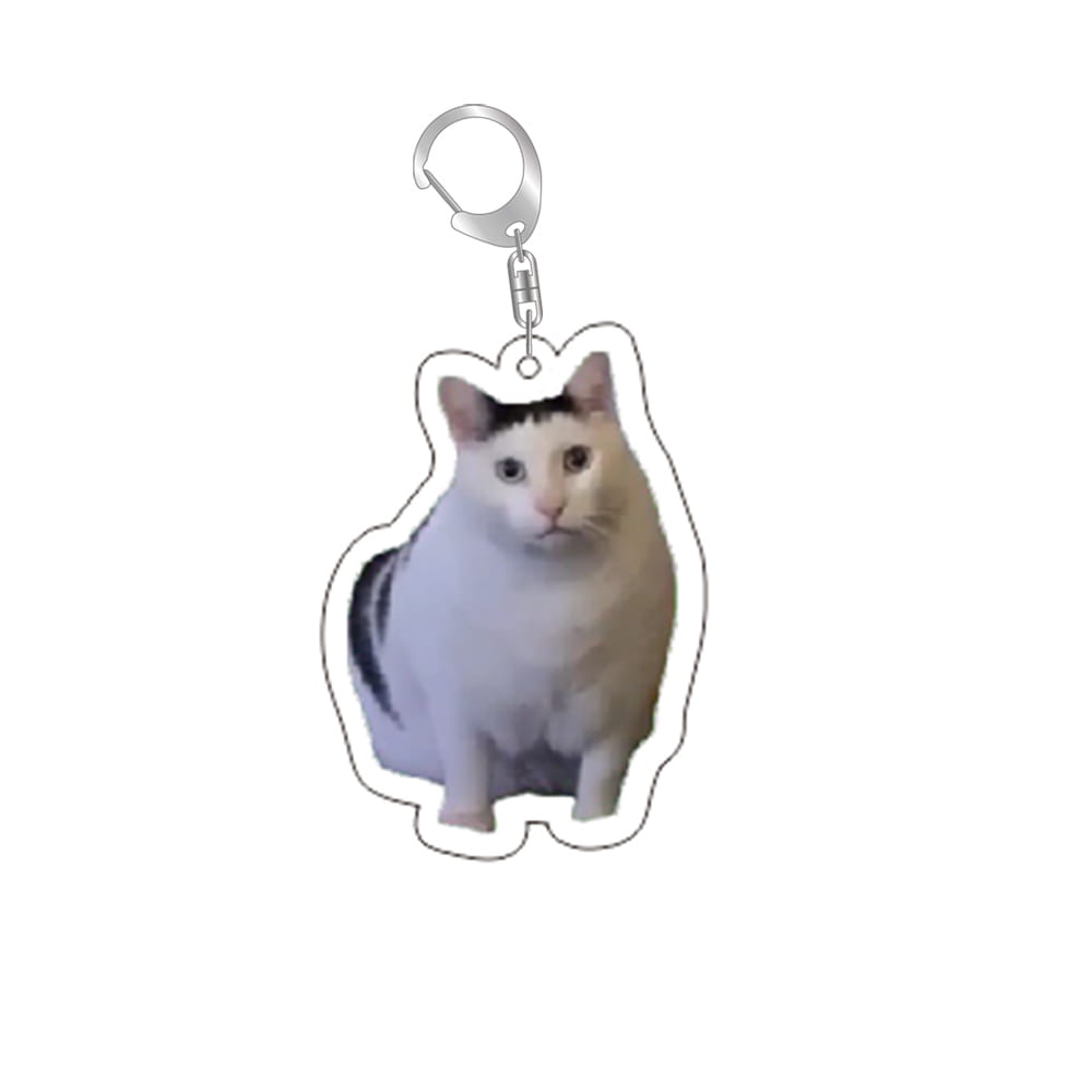 A white and black cat-shaped acrylic keychain with a silver metal clasp from the cat meme acrylic keychain collection.