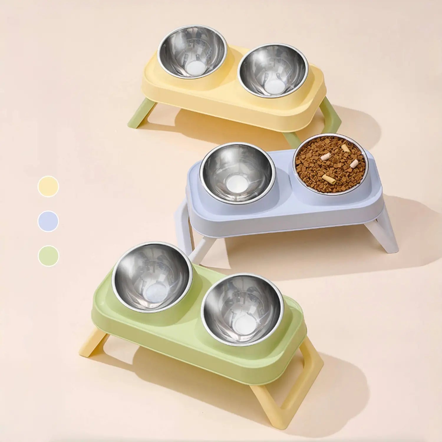 Set of three colorful plastic elevated pet feeding tables each with two stainless steel tilt bowls for improved pet feeding ergonomics.
