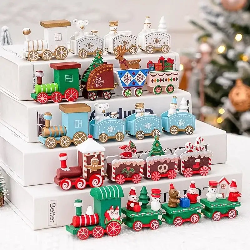 Collection de petits trains de Noël en bois, aux wagons peints aux couleurs variées, présentant des motifs de fête, comprenant des bonhommes de neige, des rennes et le Père Noël, pour la décoration de table de fêtes.
