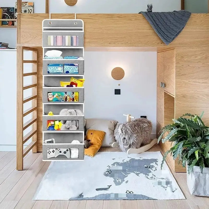 Gray over door hanging storage organizer made of fabric with five pockets and a top loop for easy attachment