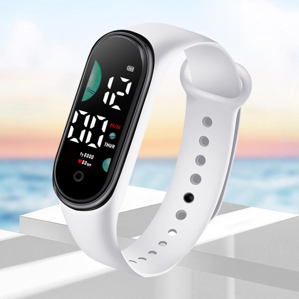 White silicone band electronic watch with large font screen and black digital display showing time date and heart rate designed as a waterproof digital sports watch.