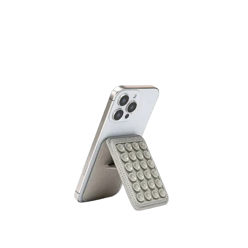 Silver leather foldable phone stand with circular suction cups for magsafe magnetic card holder and card holder use