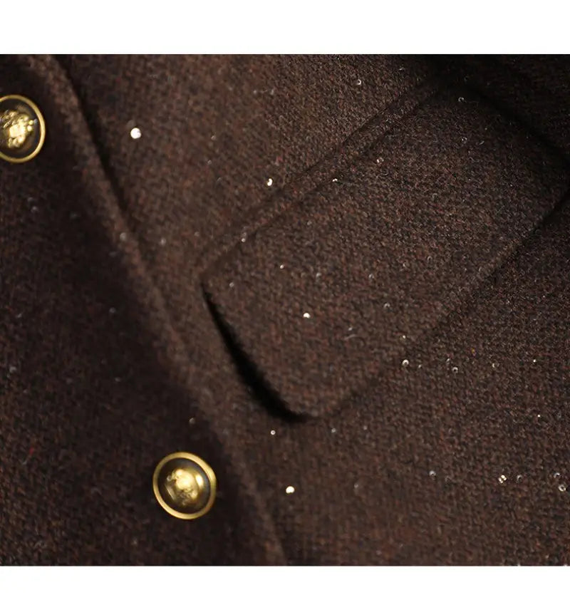 Dark brown wool blend double breasted blazer with gold toned buttons featuring embossed Medusa heads.