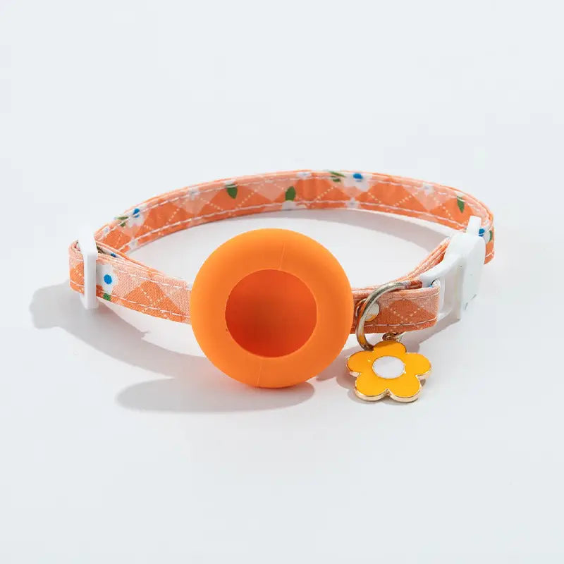 orange floral-patterned airtag cat collar with a bright orange silicone bell yellow flower-shaped charm and integrated airtag protective case for outdoor park dog and park dog cat use