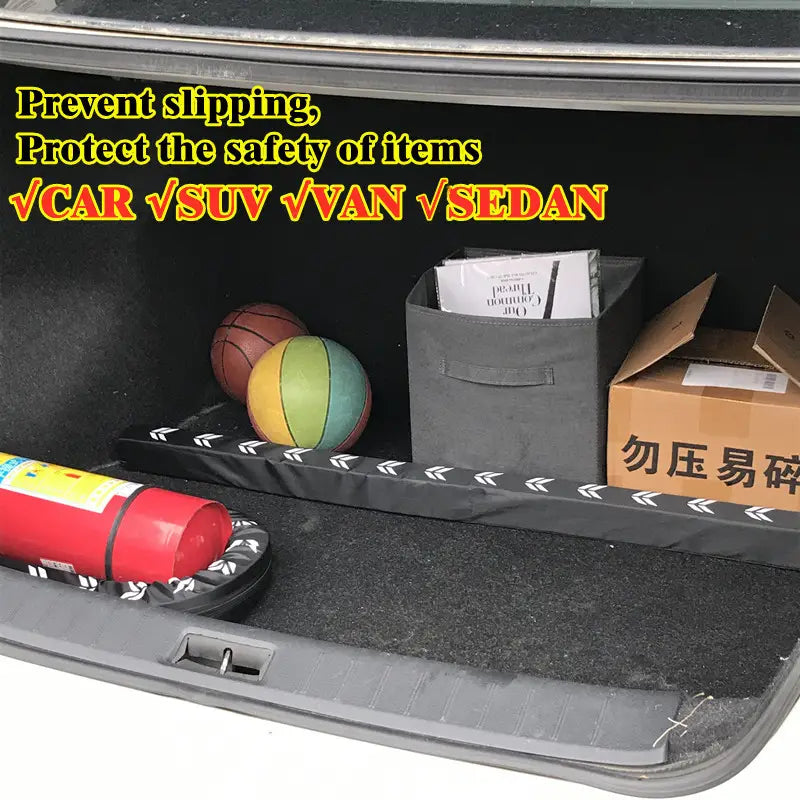 Black rubberized car trunk organizer with flexible anti-collision stick and white arrow pattern trim.