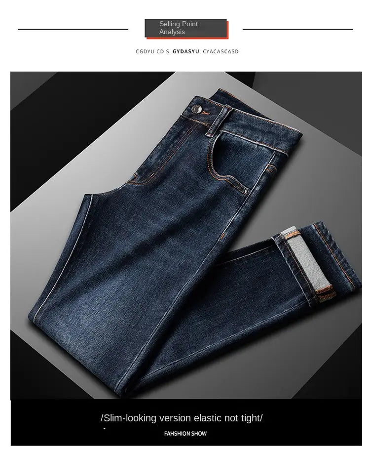 Slim fit dark blue denim jeans for men featuring a slim-fit design and rolled cuffs.