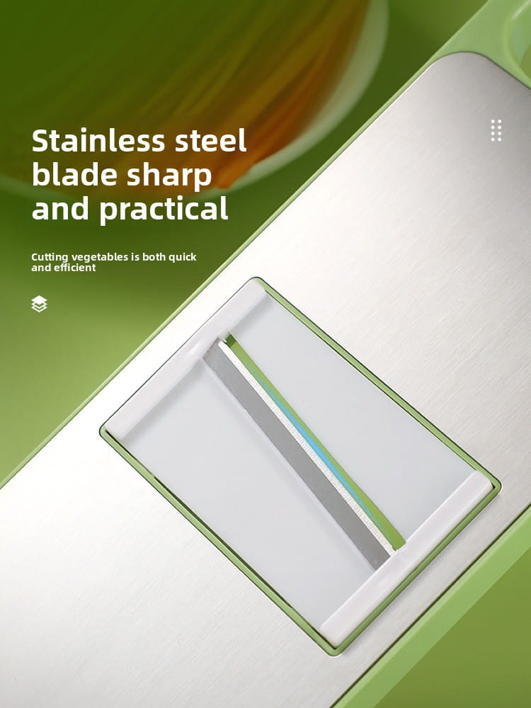 A sleek modern multi-functional stainless steel vegetable slicer shredder with a sharp blade and minimalist white plastic housing accented by green trim.