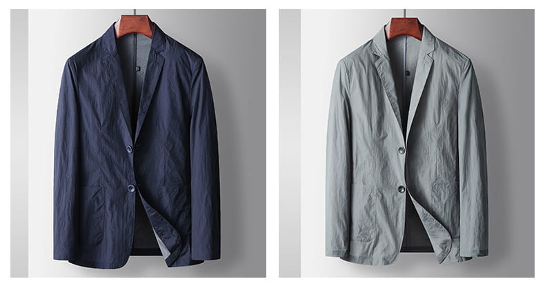 Herren-Freizeit-Polyester-Blazer-Anzugjacken in Marineblau und Hellgrau mit leichtem Stoff und einer dezenten, strukturierten Oberfläche für den Herren-Hombre-Look