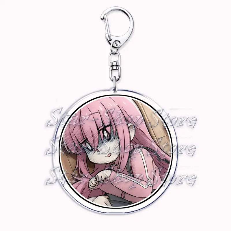Circular acrylic keychain featuring an anime character with pink hair and matching outfit encased in a clear frame from Bocchi the Rock.