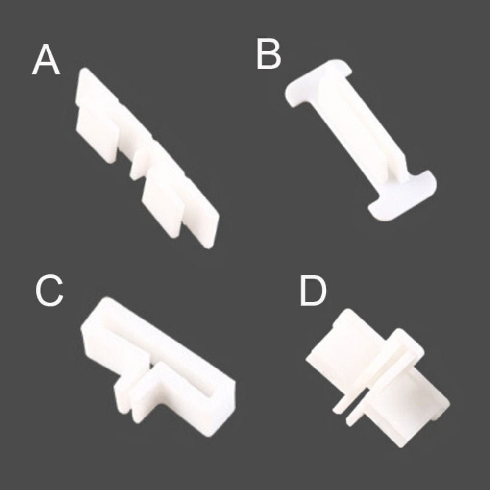 white plastic fixing clips with distinct geometric shapes and interlocking designs for drawer divider accessories featuring buckle fixing clip functionality