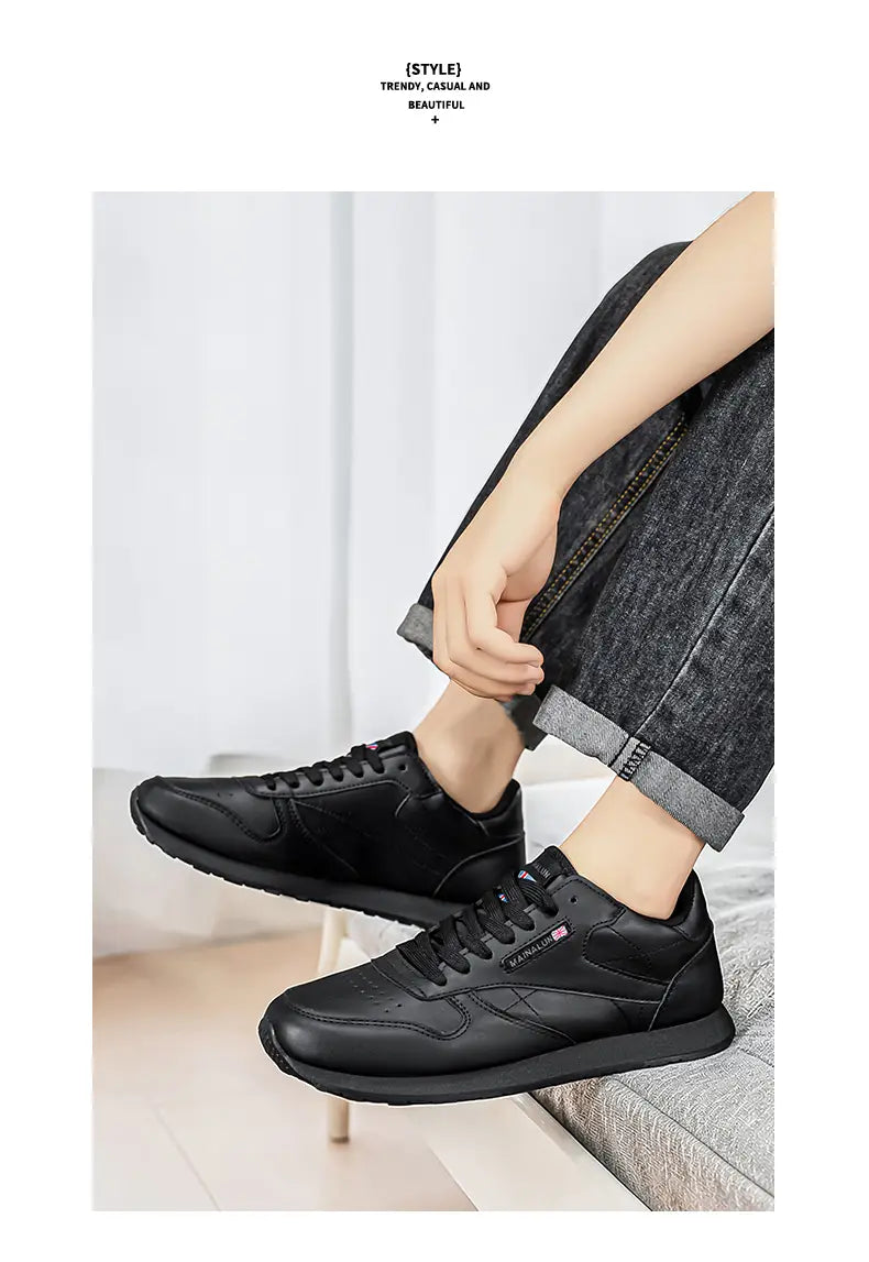 Schwarze Leder-Freizeitsneaker für Herren mit elegantem, minimalistischem Design und dezenten Markenzeichen, ideal für Sport und den Alltag.