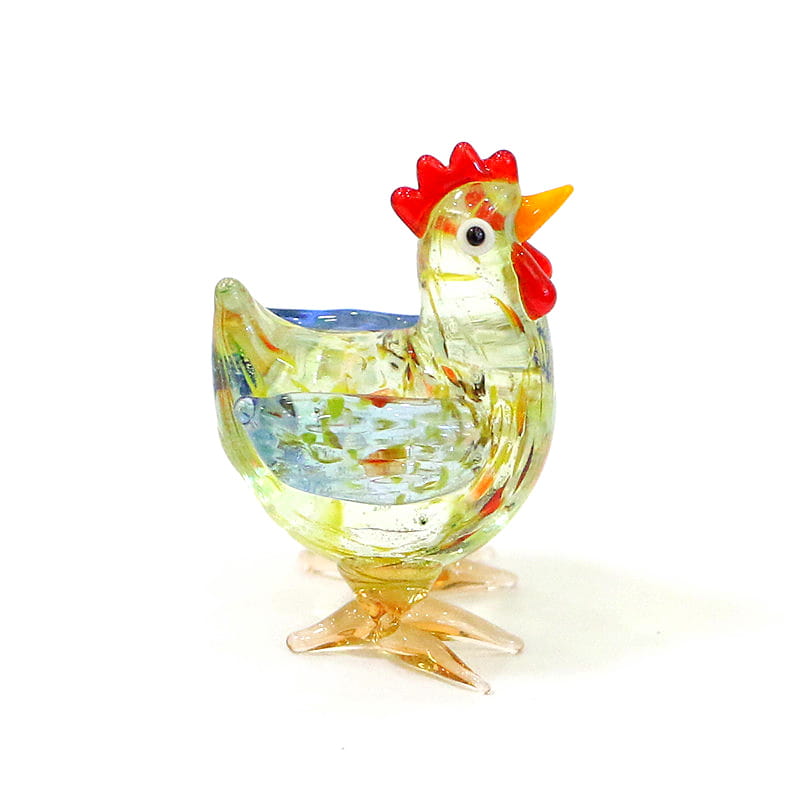 A translucent glass rooster miniature figurine with a red comb and wattle, yellow beak, and multicolored internal swirls, designed as an Easter ornament.