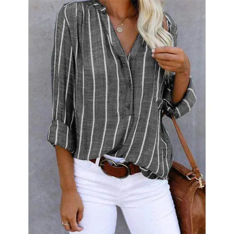 Gray and white vertically striped button-up blouse with rolled sleeves made from polyester cotton fabric sourced from mainland china.