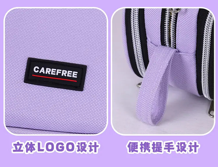 Große Stifttasche mit hoher Kapazität in Flieder, Stationery-Organizer mit lavendel-farbenem Stoff, schwarzem Reißverschlussbesatz, passendem Griff und „Carefree“-Logo-Patch.