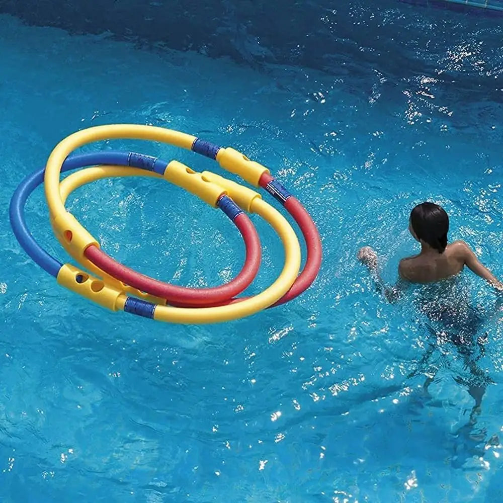 brightly colored yellow red and blue interlocking pool noodle connectors float together in water as a training aid float holder.