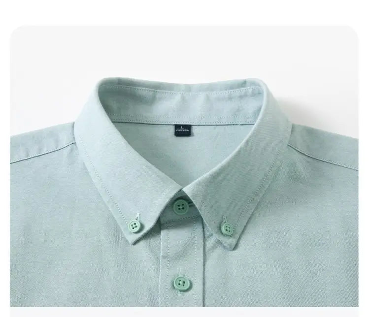 Camisa Oxford de algodón color azul claro, corte slim fit, para hombre, con diseño abotonado color verde claro, cuello nítido y botones a juego