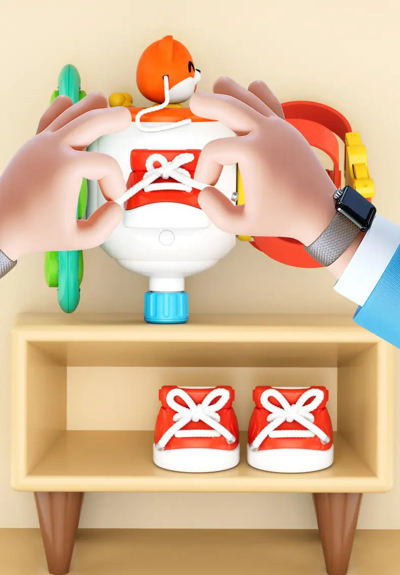 Jouet de voyage cube d’occupation Montessori blanc et rouge : station d’attache de chaussures avec une tête de renard orange sur le dessus.