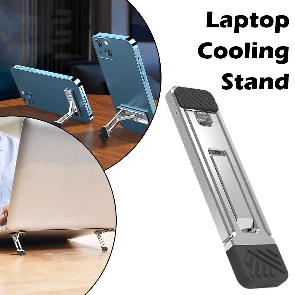 Support portable pour ordinateur portable pliant en aluminium, argent et noir, avec une prise texturée à la base, pour un refroidissement et un maintien stables.