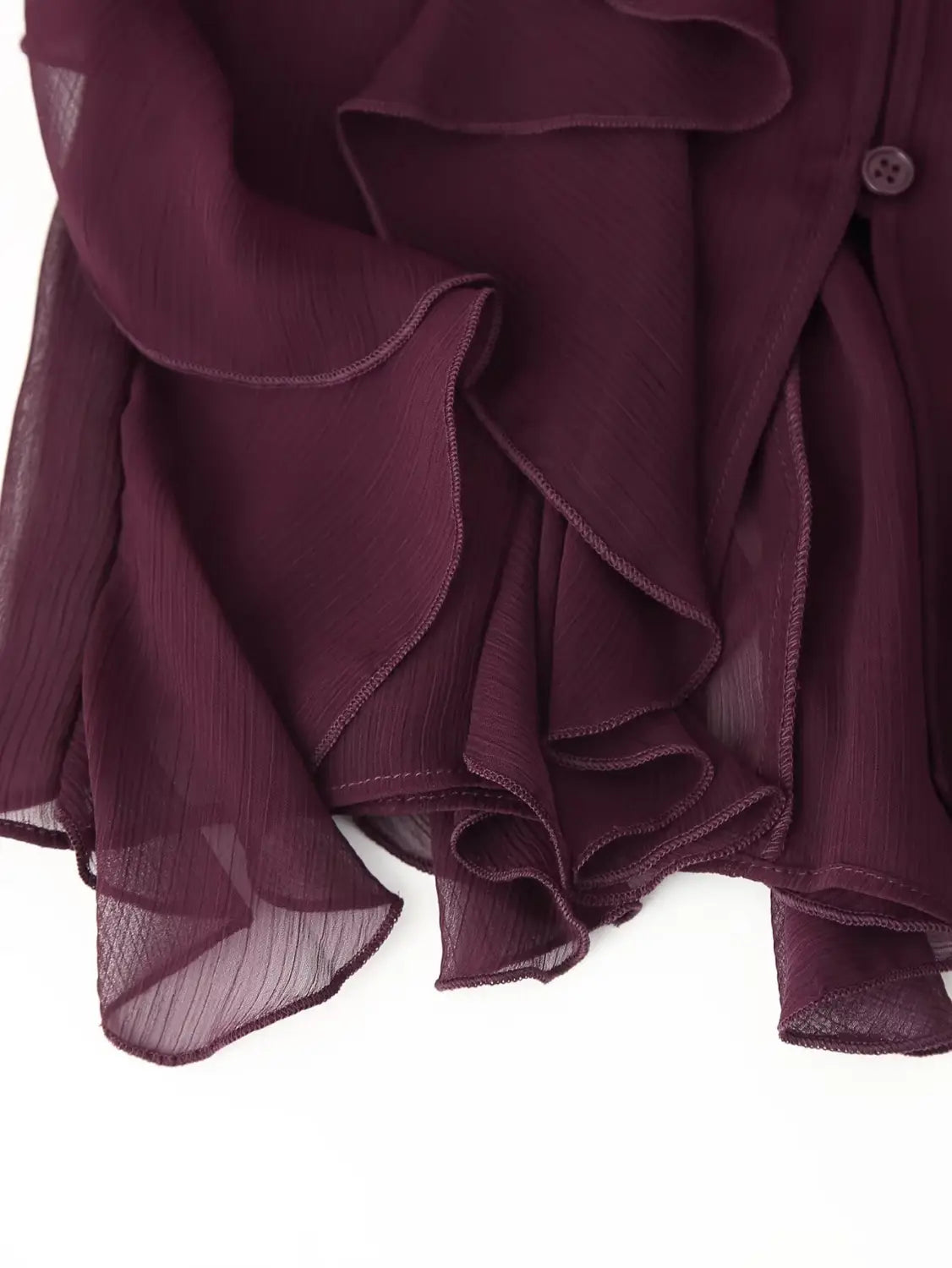 Sheer deep burgundy chiffon ruffle shirt long sleeve with layered ruffles and a subtle textured weave featuring a v-neck design.