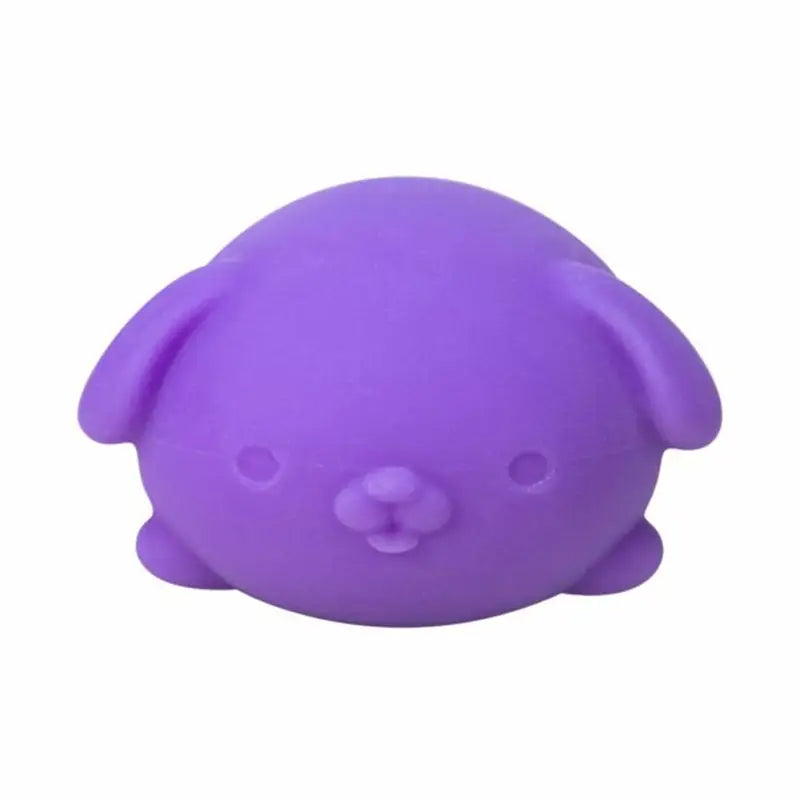 Purple squishy puppy stress ball with soft rounded features and simple facial details shown from the front as a sensory fidget toy with quick rebound.