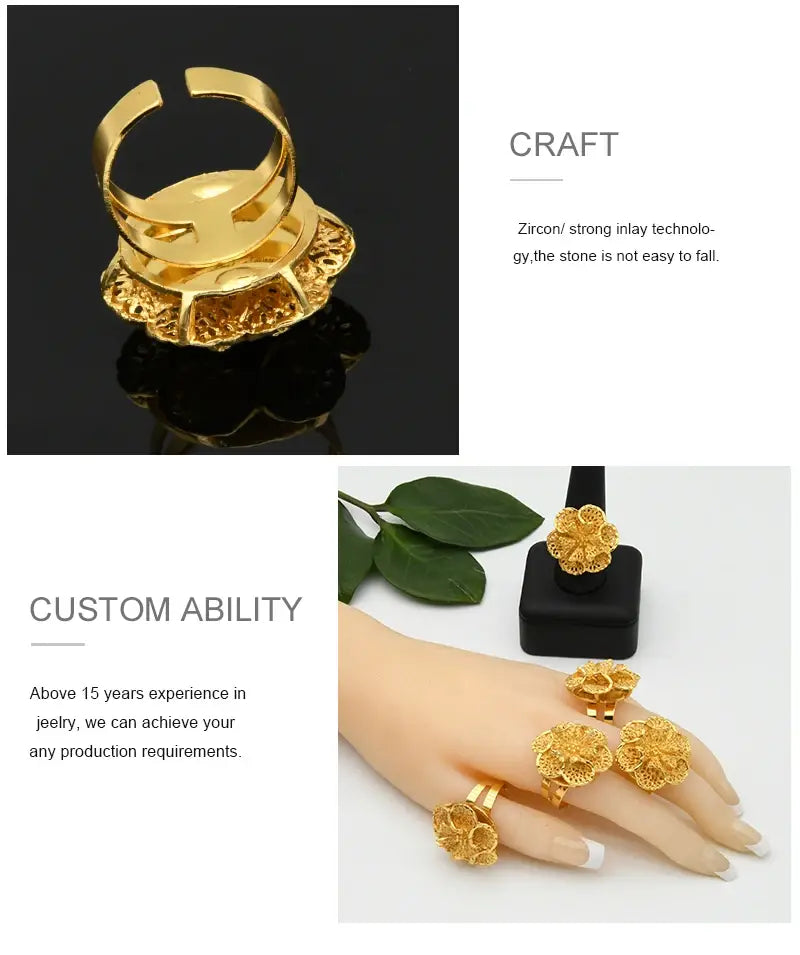 24k gold plated dubai spiral ring for women featuring a gold-colored intricate filigree flower shape with a hollow center and detailed petals.