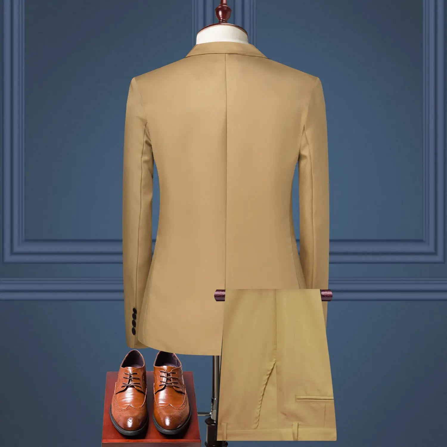 men solid color two piece leisure suit featuring a tan wool suit jacket with matching trousers and brown leather dress shoes displayed from the front